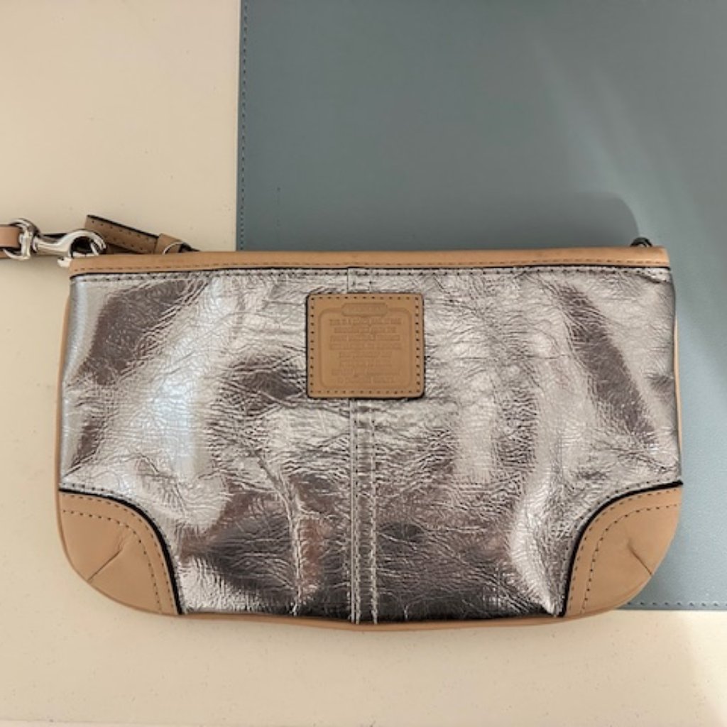 Coach Silver Metallic Wristlet With Beige Leather Trim